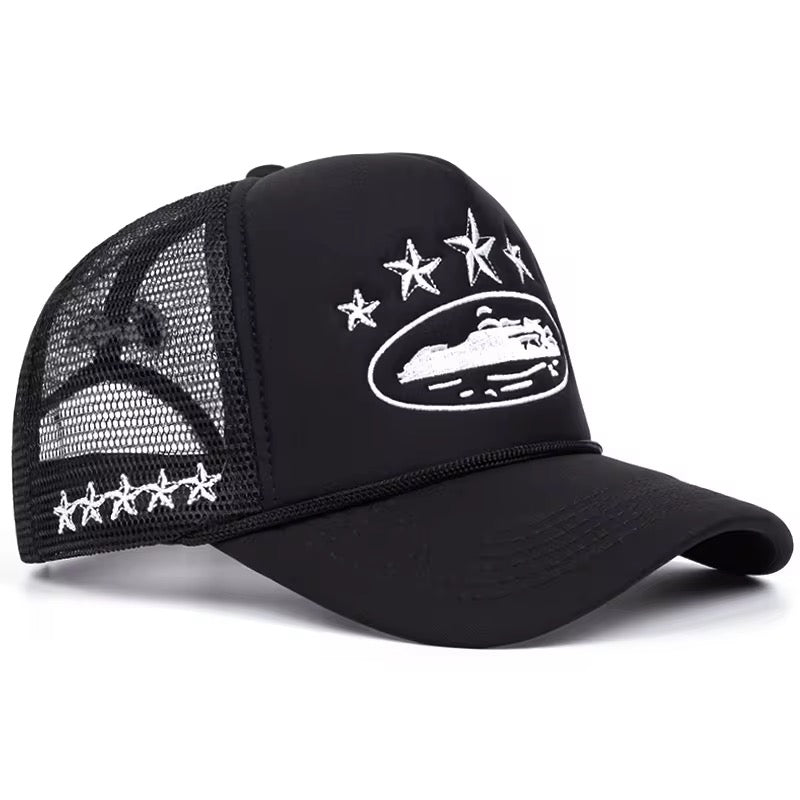 Corteiz Alcatraz Trucker Hat – White / Black
